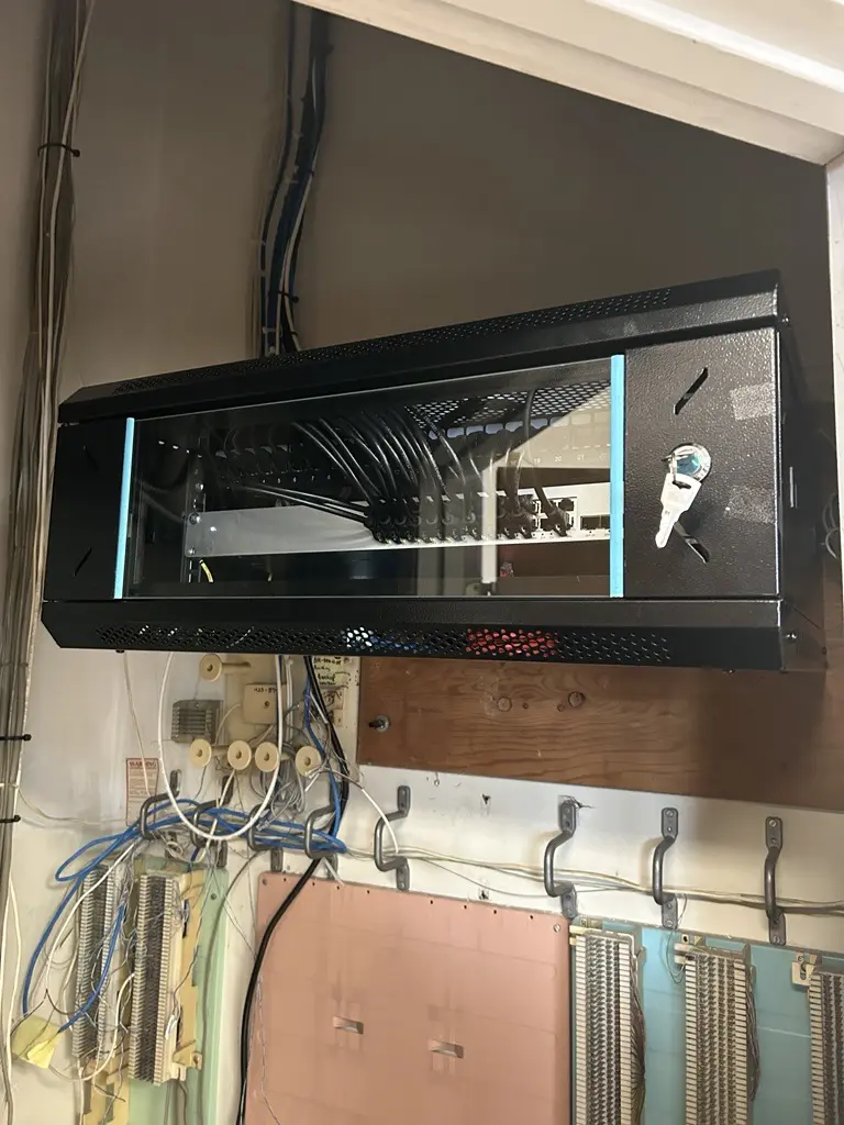 Network server rack with cables and key.